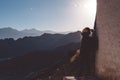 Portrait image of a beautiful Asian woman standing on the top of view point with Leh city Royalty Free Stock Photo