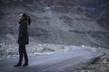 Portrait image of a beautiful Asian woman tourist standing and walking on the road Royalty Free Stock Photo