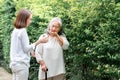 Asian elderly woman Eating medicine with a daughter as a nurse to take care Royalty Free Stock Photo