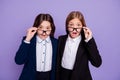 Portrait of impressed children touch specs stupor isolated over purple violet background