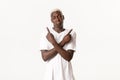 Portrait of indecisive african-american guy, shrugging and pointing fingers sideways, standing white background