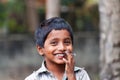 Portrait of Indian boy on the street in fishing village Royalty Free Stock Photo