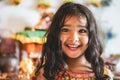 Portrait of indian female kid wearing sari dress - Southern asian child having fun smiling in front of camera - Childhood,
