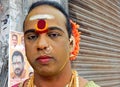 Portrait of Indian Hindu man dressed as woman outside temple during Bonalu a ritual