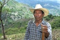 Portrait of Indian man in mountainous landscape
