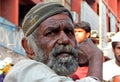 Portrait of Indian senior man seeking help / begging