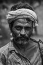 Portrait of a Indian Shepherd man in white turban in India. Black and white