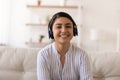 Portrait of Indian woman in headphones have video call Royalty Free Stock Photo