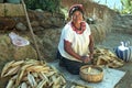 Portrait of Indian woman during peeling corn
