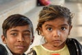 Portrait of Indian young girl and boy at Pushkar lake in Rajasthan. India Royalty Free Stock Photo