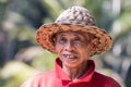 Portrait of an indonesian farmer smiling.