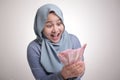 Indonesian Muslim Woman Holding Rupiah Money Royalty Free Stock Photo