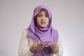 Indonesian Muslim Woman Confused wbout Her Rupiah Money