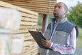 portrait industrial worker with clipboard