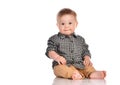 Portrait of infant child baby boy toddler with dark blue eyes. Royalty Free Stock Photo