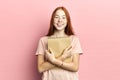 Portrait of intelligent cute clever happy female student with notebook Royalty Free Stock Photo