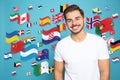 Portrait of interpreter and flags of different countries on light blue background