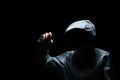 Portrait of Invisible man in the hood on black background Royalty Free Stock Photo