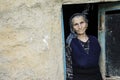 Portrait of an iranian woman in traditional cloth at doorway