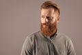 Portrait of Irish man looking aside. Serious man with red beard. Bearded man with unshaven face Royalty Free Stock Photo