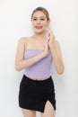 Portrait isolated cutout closeup shot of millennial Asian young beautiful sexy long hair model in seamless tube cropped top Royalty Free Stock Photo