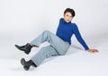 Portrait isolated cutout studio full body Asian young sexy slim fashionable LGBTQ gay male model in turtleneck long sleeve shirt Royalty Free Stock Photo