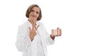 Portrait: isolated older doctor holding medicine making three fingers.