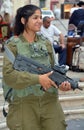 Portrait of Israel Defense Forces woman downtowm Jerusalem,