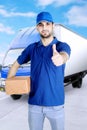 Italian courier show thumb up near his truck Royalty Free Stock Photo