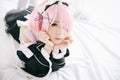 Portrait of Japan anime cosplay woman , white japanese maid in white tone room