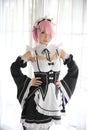 Portrait of Japan anime cosplay woman , white japanese maid in white tone room