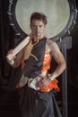 Portrait of a Japanese drummer Taiko with drumsticks