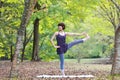 Portrait of Japanewe woman doing yoga Extended Hand-To-Big-Toe Pose Royalty Free Stock Photo