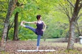 Portrait of Japanewe woman doing yoga Extended Hand-To-Big-Toe Pose Royalty Free Stock Photo