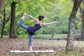 Portrait of Japanewe woman doing yoga Lord of the Dance Pose Royalty Free Stock Photo