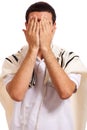 Portrait of jewish man closing face with his hands