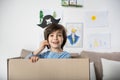 Happy adolescent boy playing pirate games