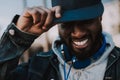 Portrait of a joyful afro american man wearing his cap Royalty Free Stock Photo