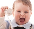 Portrait of joyful baby boy with pacifier