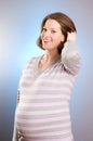 Portrait of joyful beautiful pregnant woman