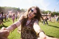 Portrait Of Young Boho Woman Having Fun At Festival