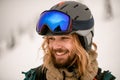 Portrait of joyful man skier wearing ski helmet with goggles Royalty Free Stock Photo