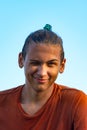 Portrait of joyful multiracial guy teenager