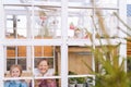 Portrait of joyful pretty little children girls sisters in beautiful dress standing posing in summer gazebo house on Royalty Free Stock Photo