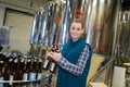 portrait joyful smiling worker working on beer brewery factory Royalty Free Stock Photo