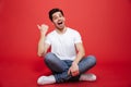 Portrait of a joyful young man in white t-shirt Royalty Free Stock Photo