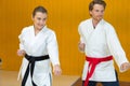portrait karate couple doing exercise Royalty Free Stock Photo