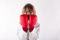 Portrait of a karate kid wearing red boxing gloves Royalty Free Stock Photo