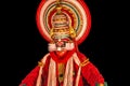 Portrait of a Kathakali Hindu temple character before the black background