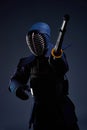 Portrait of a kendo fighter with shinai Royalty Free Stock Photo